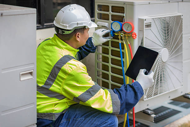 Professional Hvac technician working in Marine, IL